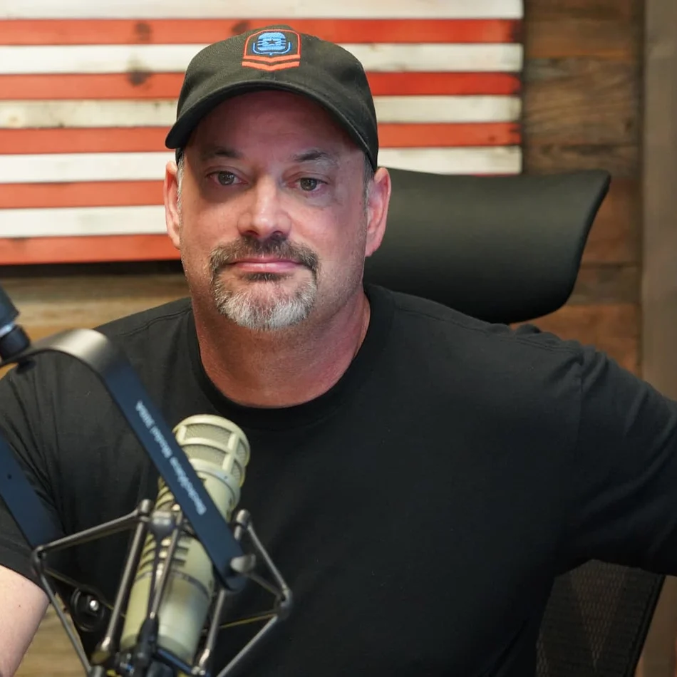 Original PodVeteran website portrait of host Ed Parcaut in his recording studio